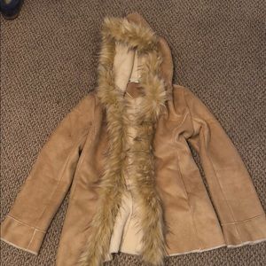 Never worn fur coat